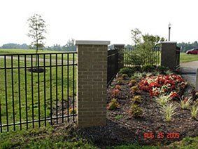 Steel Fence with Brick Pillar — Greenville, SC — Pioneer Fence in Greenville