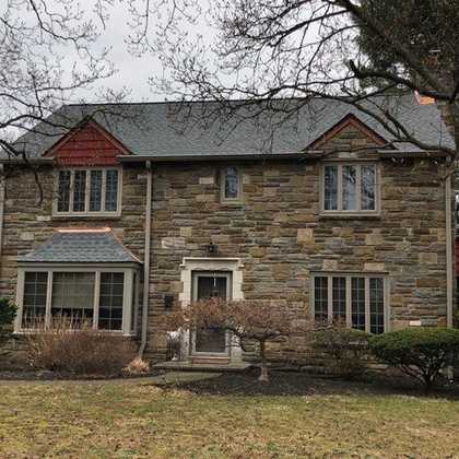 Worker Fixing Roof — Narberth, PA — Scheinfield Contractors