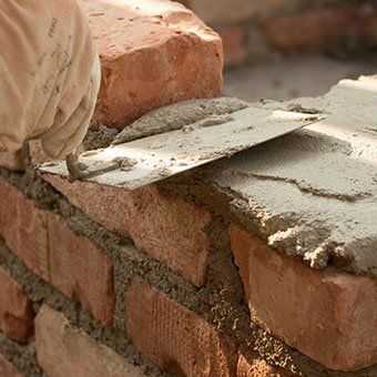 Man Laying Bricks — Narberth, PA — Scheinfield Contractors