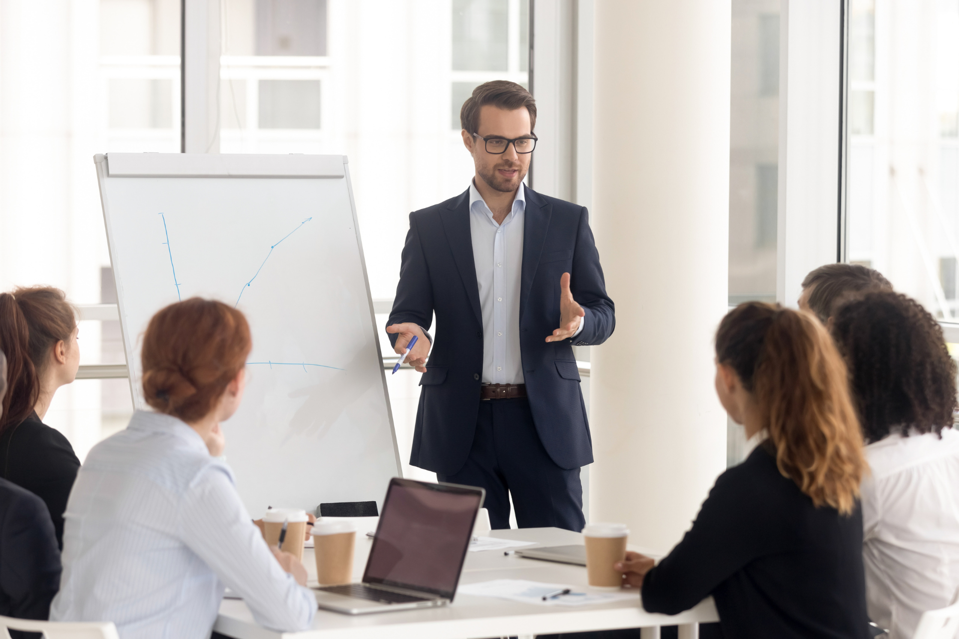 Business coach delivering a seminar