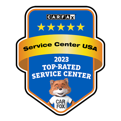 CARFAX 2023 top-rated service center badge with blue and gold shield and fox logo