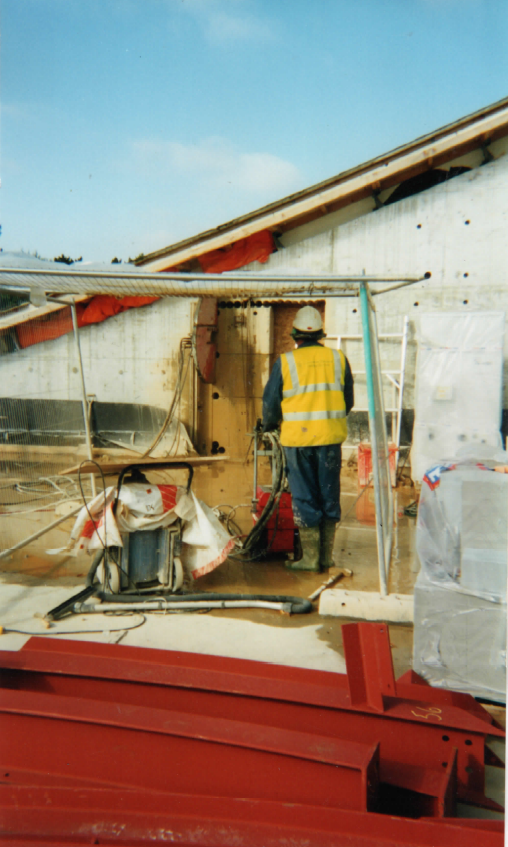 crunching and bursting the concrete using a drilling equipment