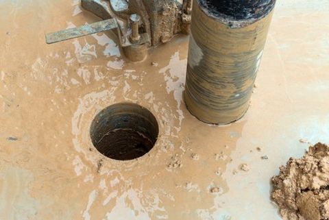 a hole made in the ground using the daimond driller