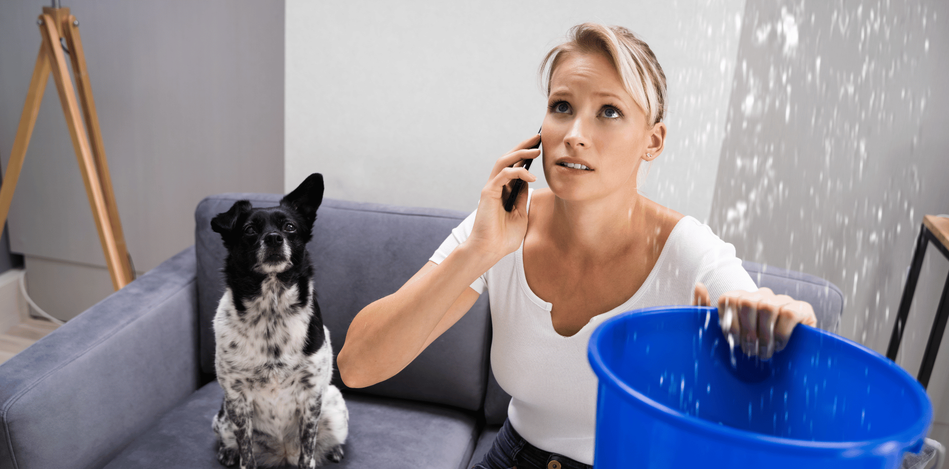 Woman holding a bucket with a leaking foor