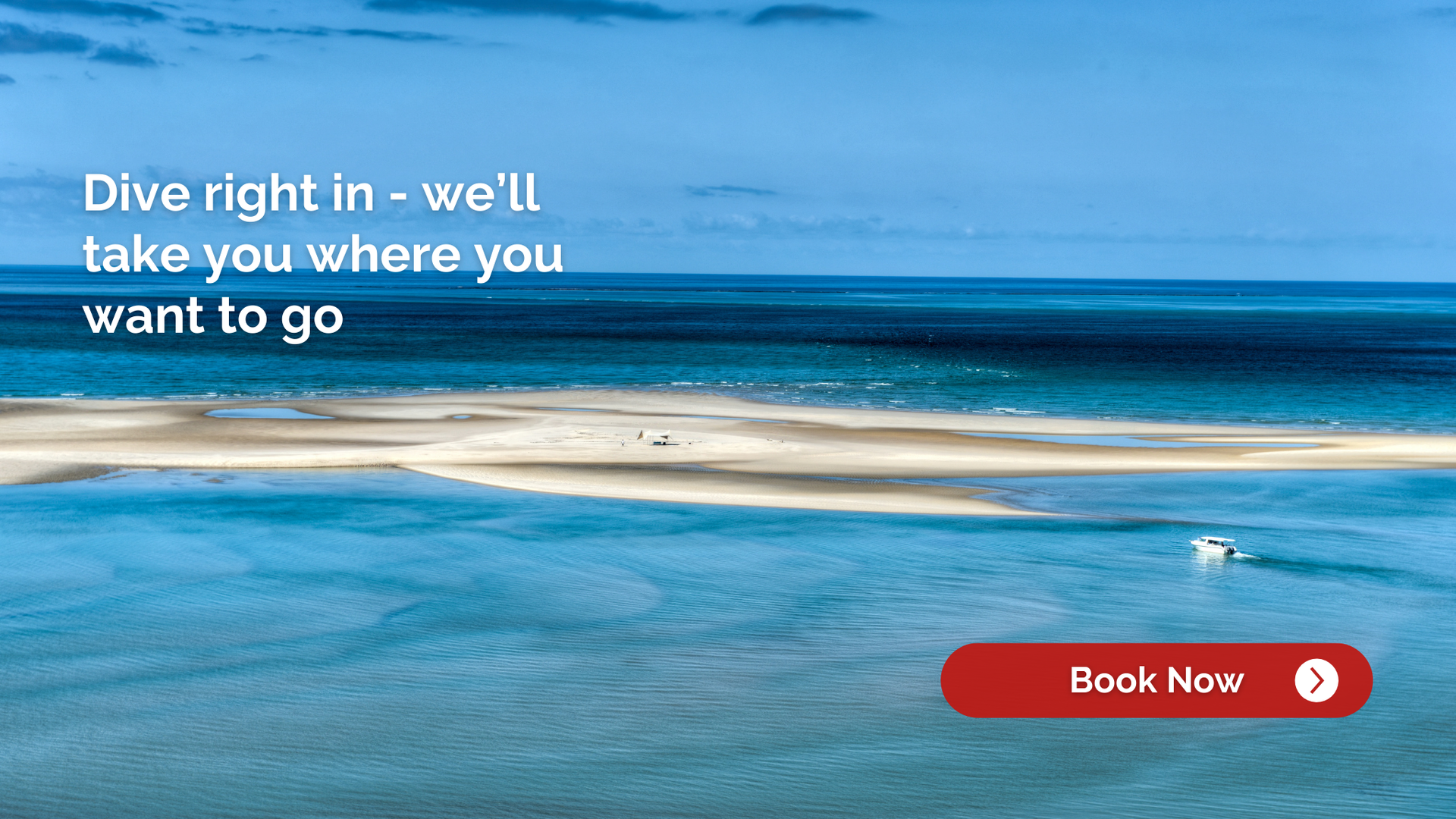 Ocean view with a sandy spit, blue water, and a boat; 