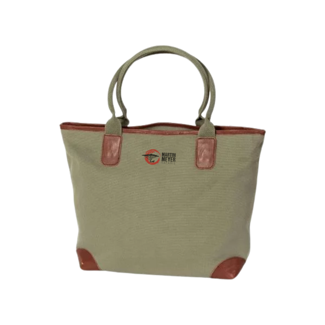 Canvas tote bag with brown handles and trim; olive green body.