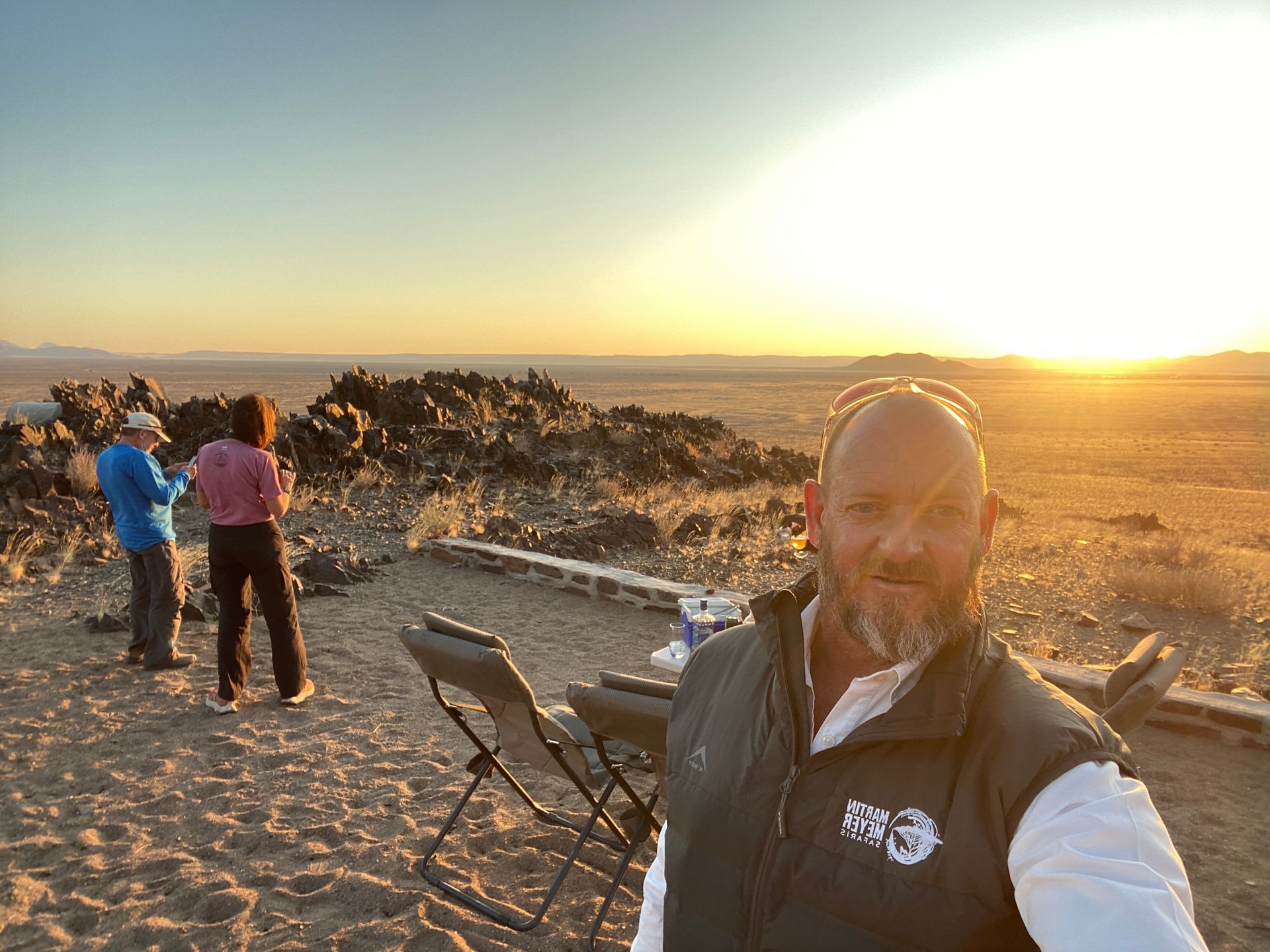 Martin Meyer, Private Safari Guide in Namibia with clients in the background