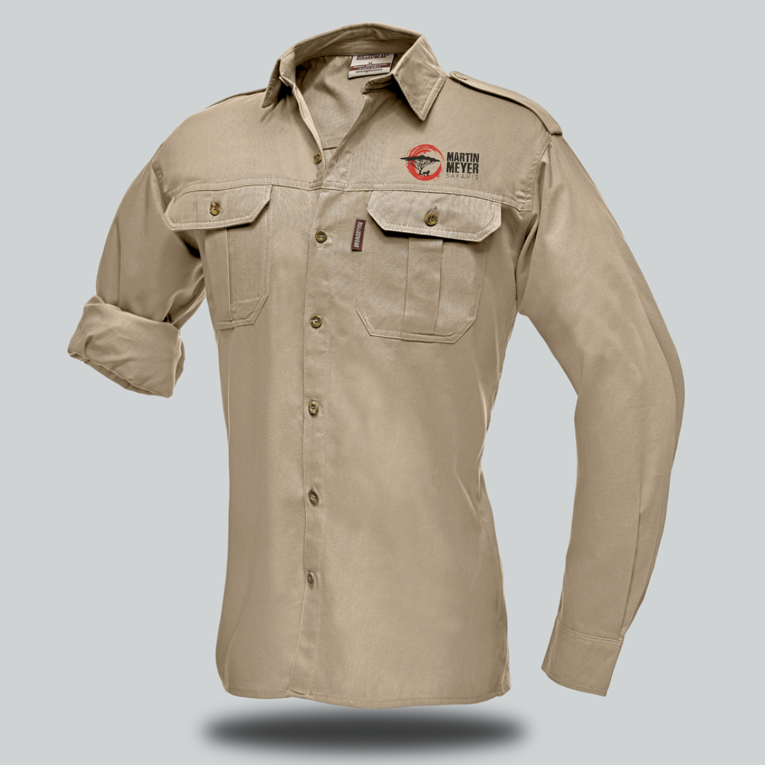 A khaki long-sleeved button-down shirt with two chest pockets, logos on the chest and shoulder, and a rolled-up sleeve.