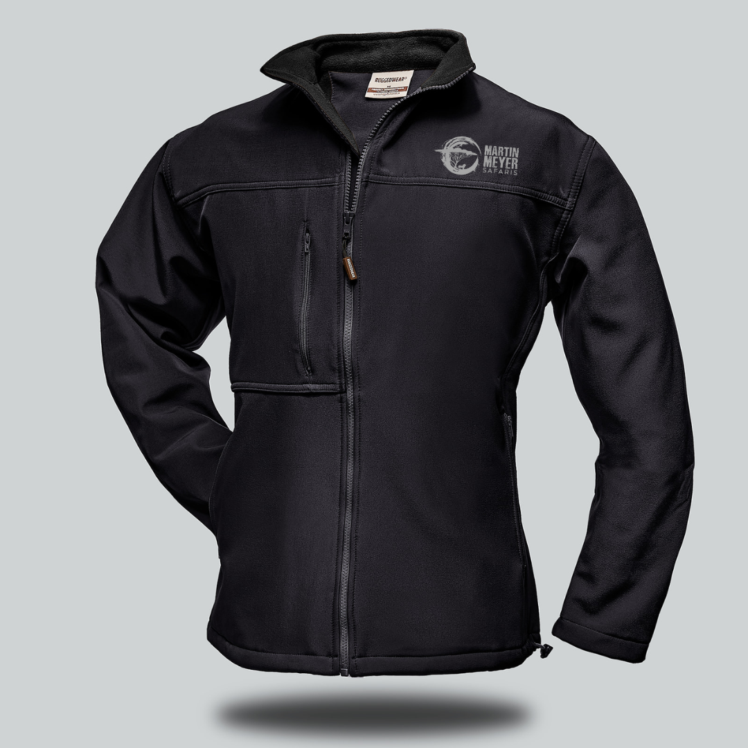 Black softshell jacket with a logo on the chest, displayed on a gray background.