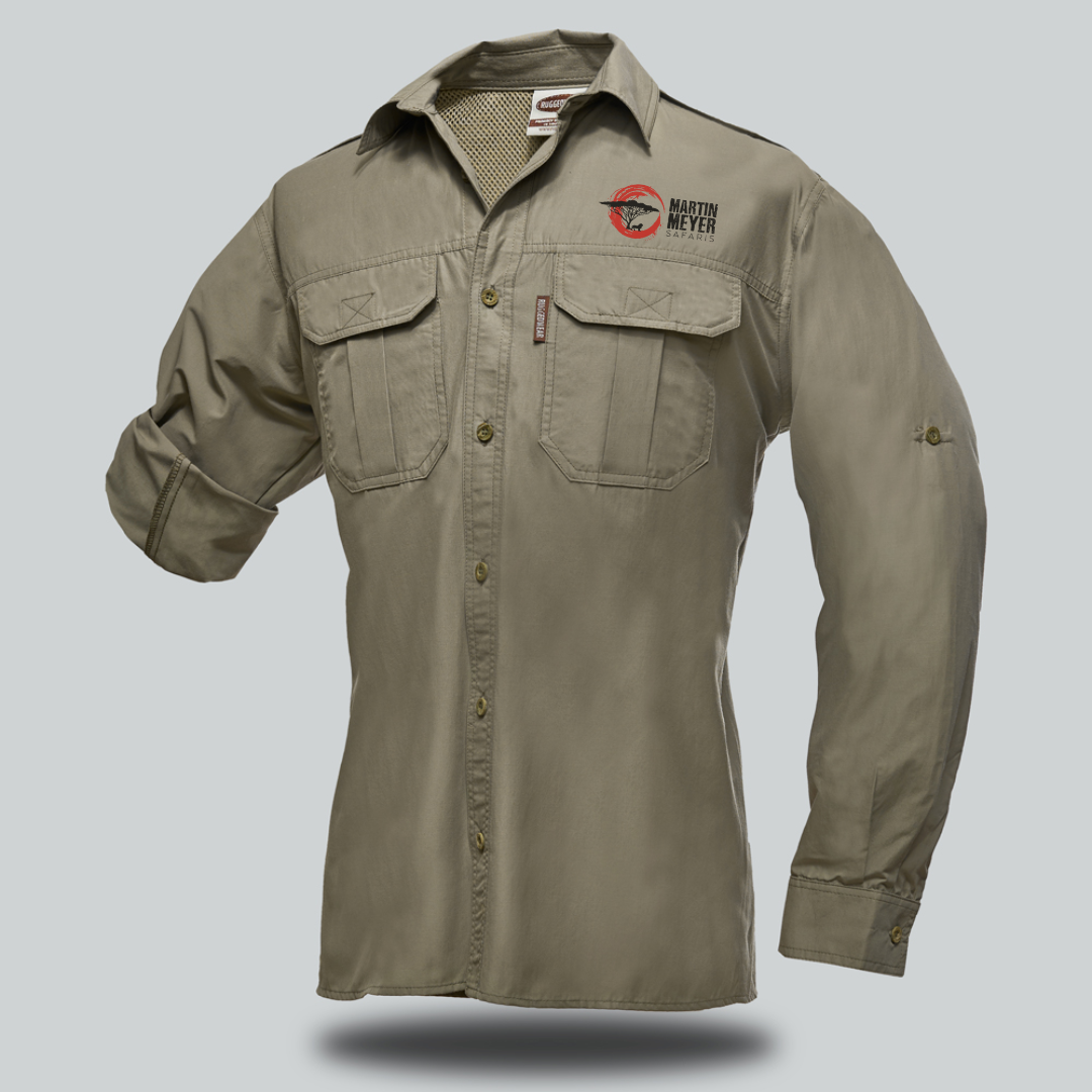 Tan long-sleeved button-up shirt with two chest pockets and a logo on the right. The sleeves are rolled up.