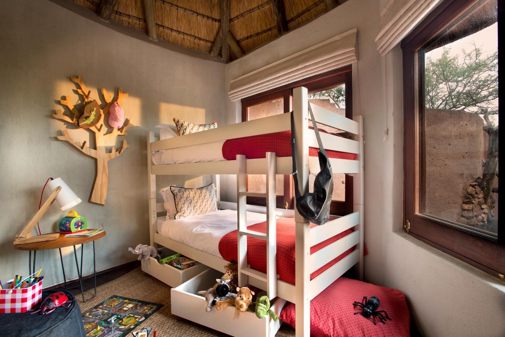 There is a bunk bed in the middle of the room. Family Friendly Safari