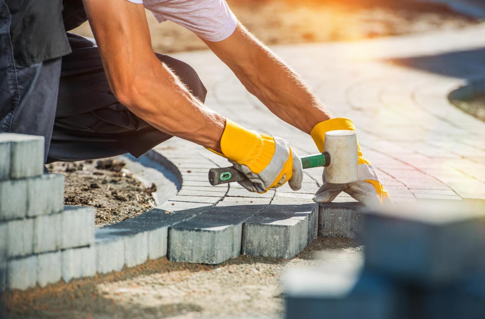 worker using a hammer