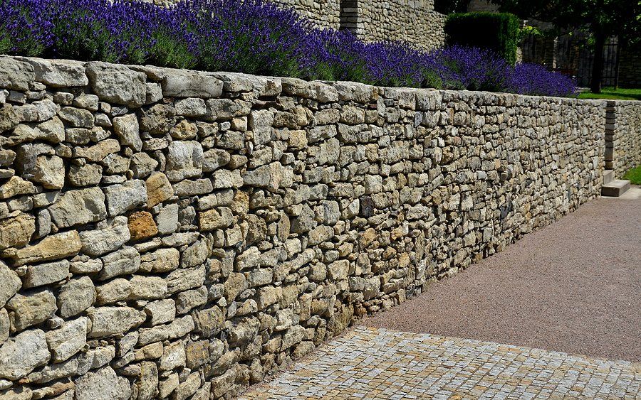 stone retaining walls beside the walkway