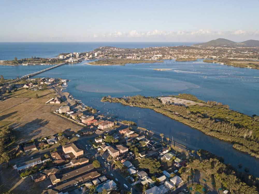 An Aerial View Of A Large Body Of Water — Todd Williams Plumbing and Gas Fitting In Forster, NSW