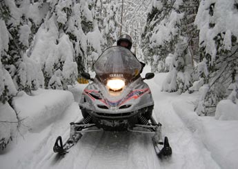 Snowmobiling in Northern Vermont near Lake Willoughby