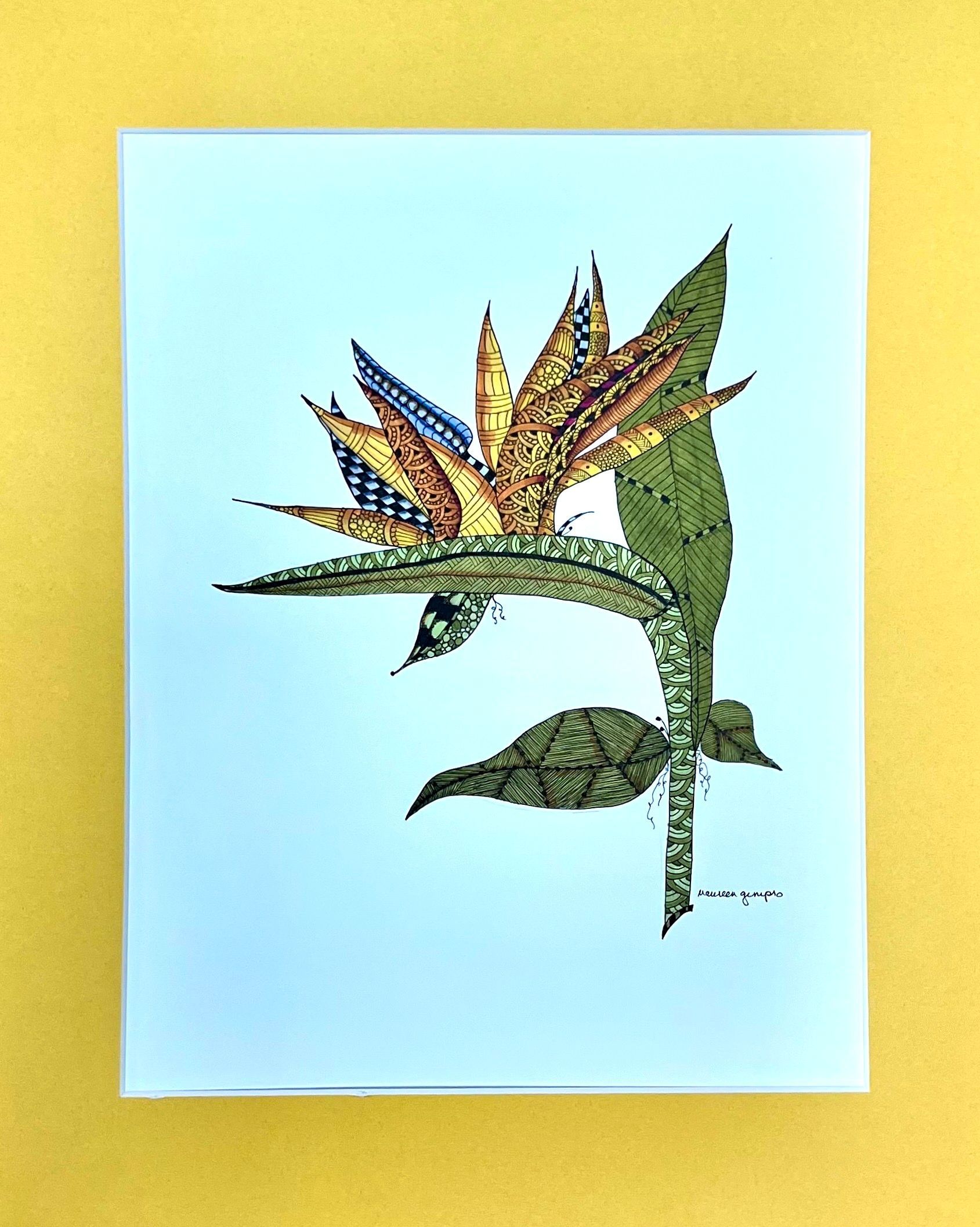 Watercolor painting of a bird of paradise flower, featuring yellow, blue, and green hues, on a white background.