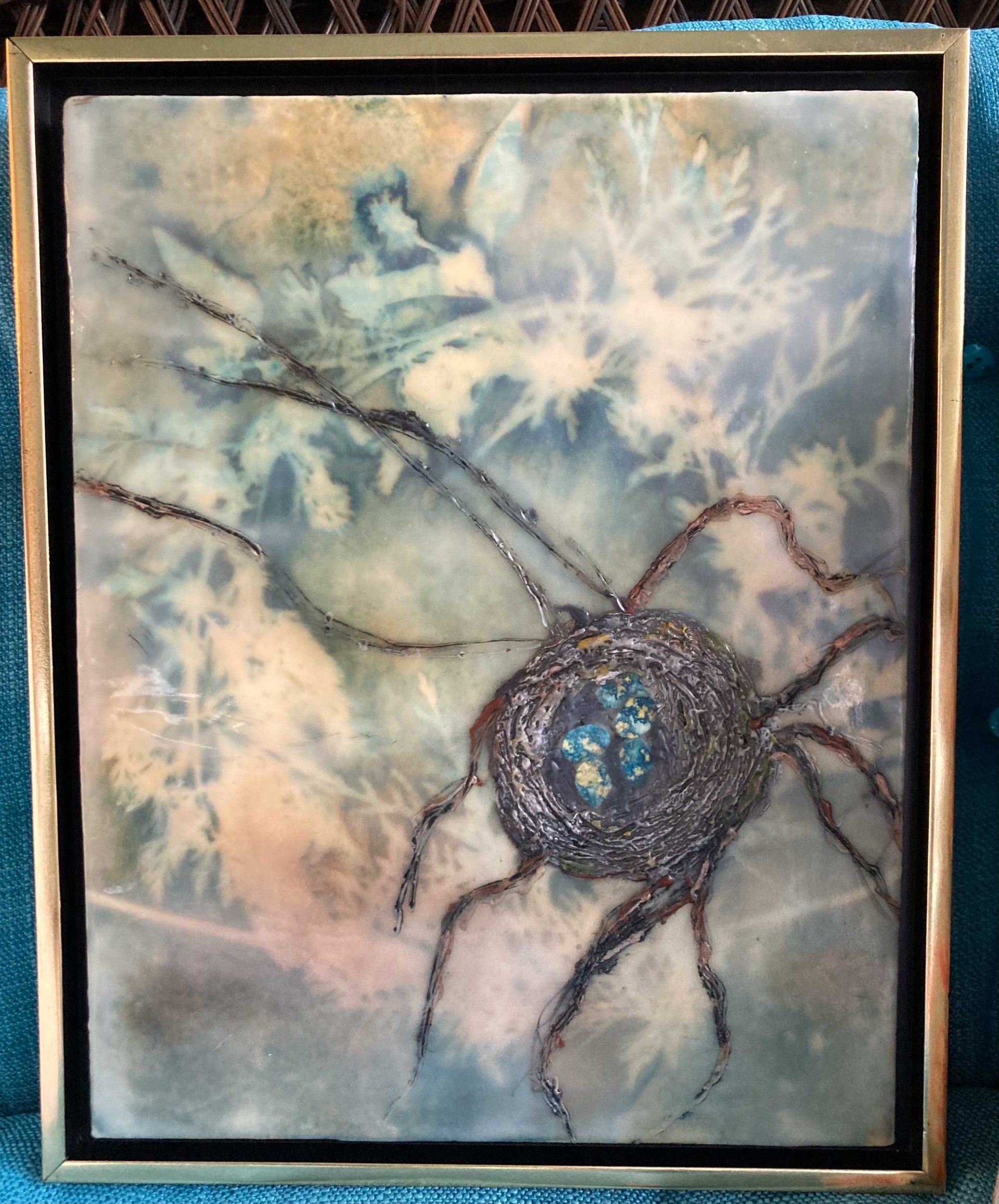 Abstract artwork: a gray sphere with spidery legs on a blue-green, mottled background.