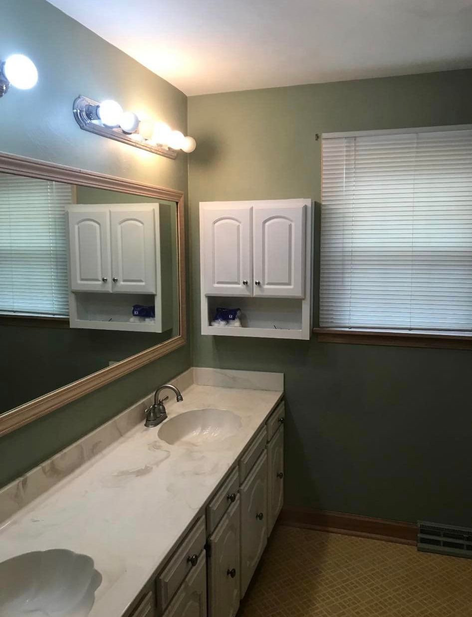 Bathroom with Two Sinks and a Large Mirror — Poland Township, OH — Donnadio Painting