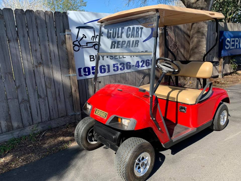 Red Golf Cart on the Road — Harlingen, TX — Golf Cart Repair Inc.