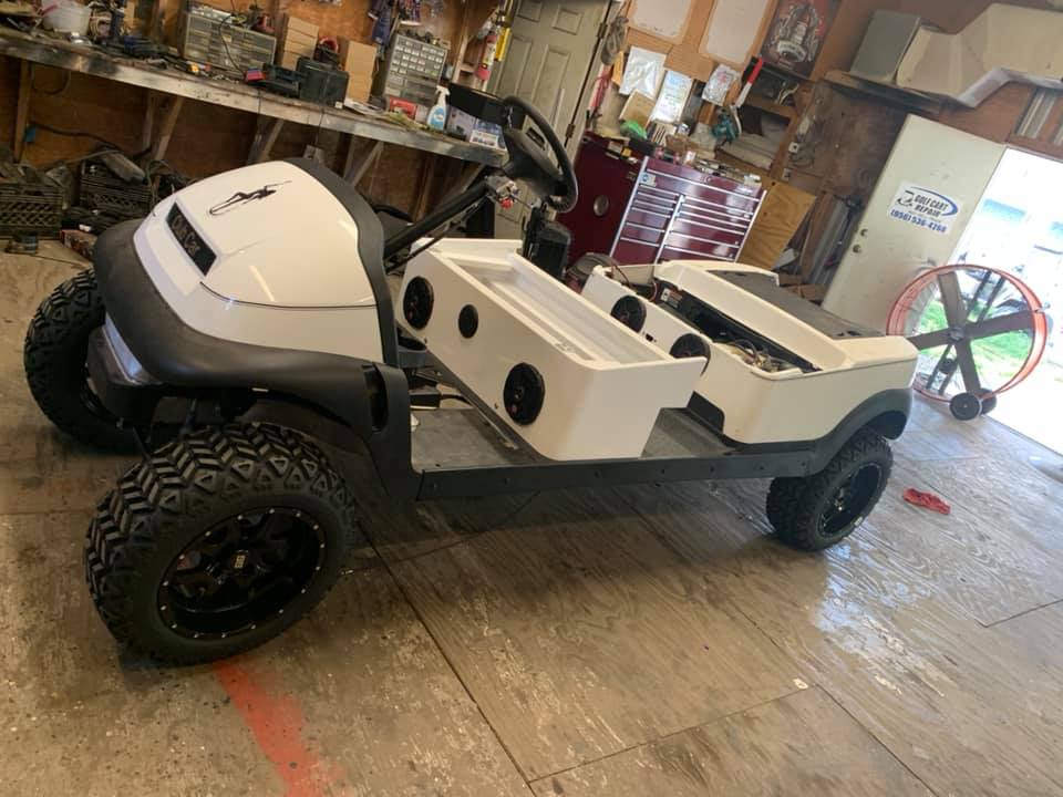 White Golf Cart on the Shop — Harlingen, TX — Golf Cart Repair Inc.