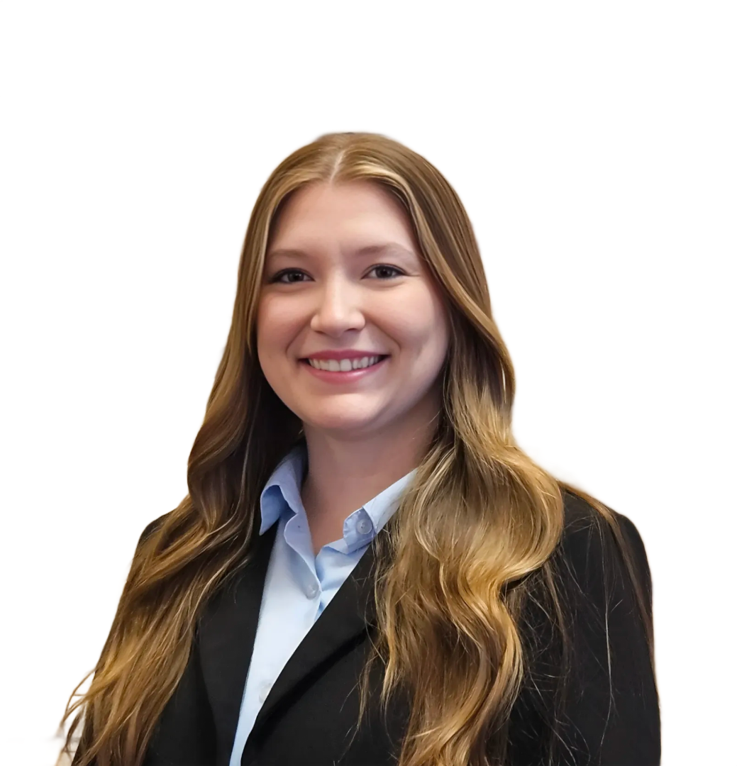 A women wearing a blue button blouse and black jacket