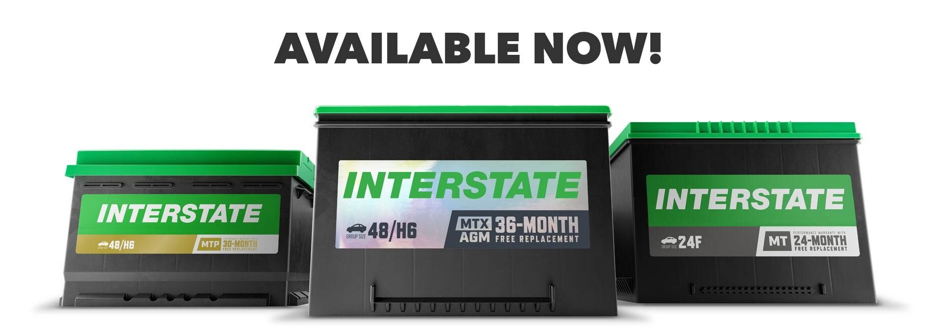 Interstate car batteries in black and green, displayed with the text 