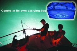 Sailors on a boat lit at night, with carrying bag image in the corner.