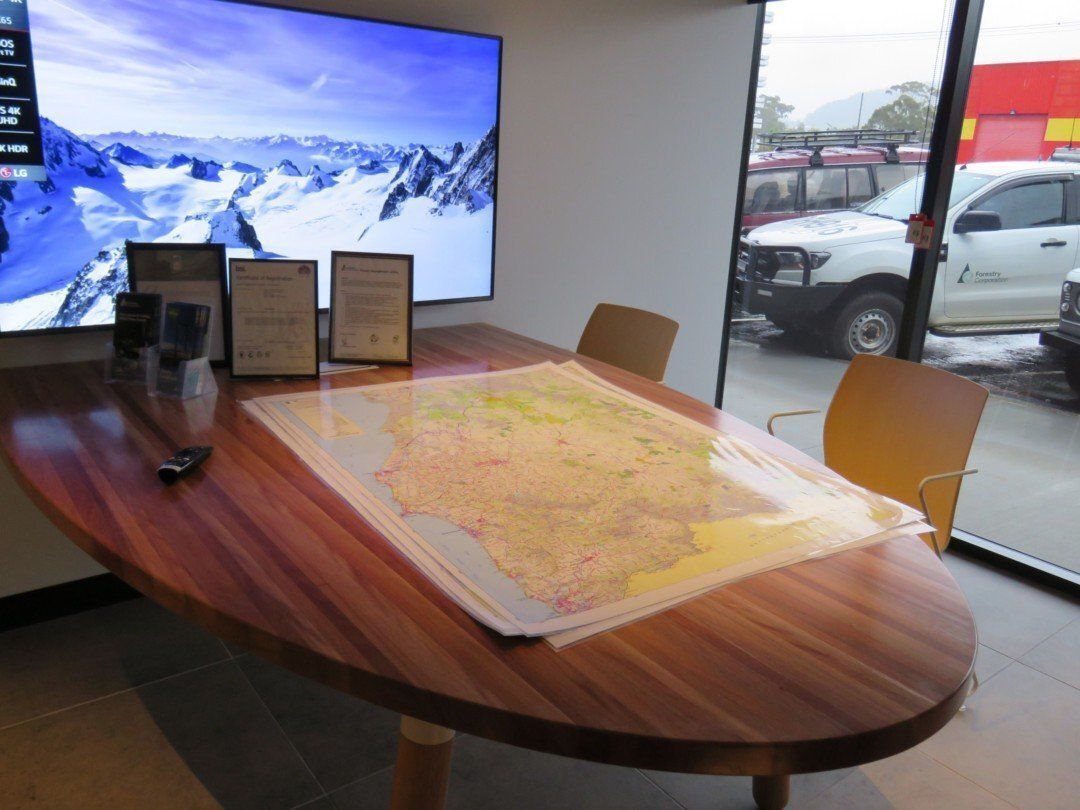 A Conference Room With a Large Map on the Table — Marshall Notaras Hardwoods Pty Ltd In Coffs Harbour, NSW