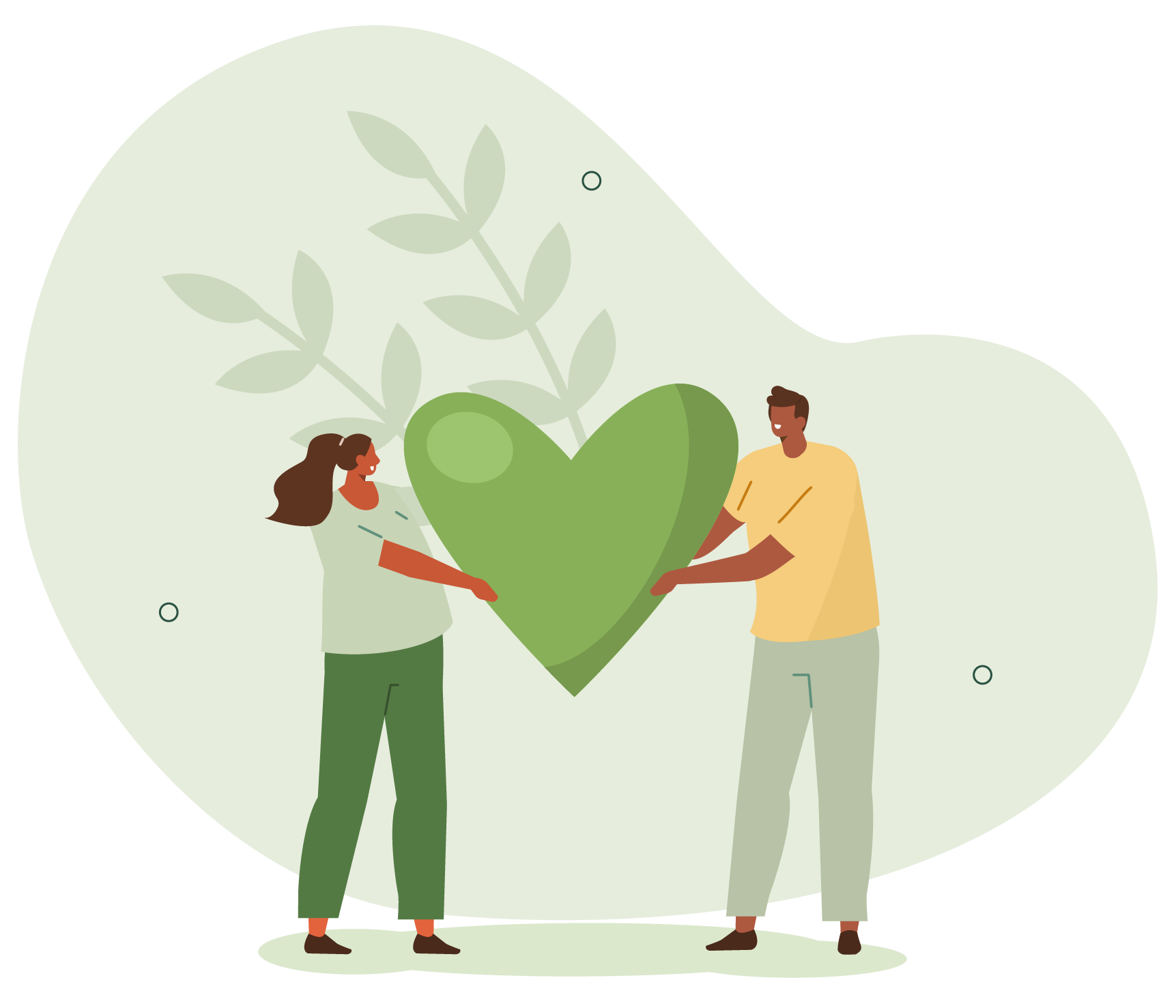 A man and a woman are holding a green heart.
