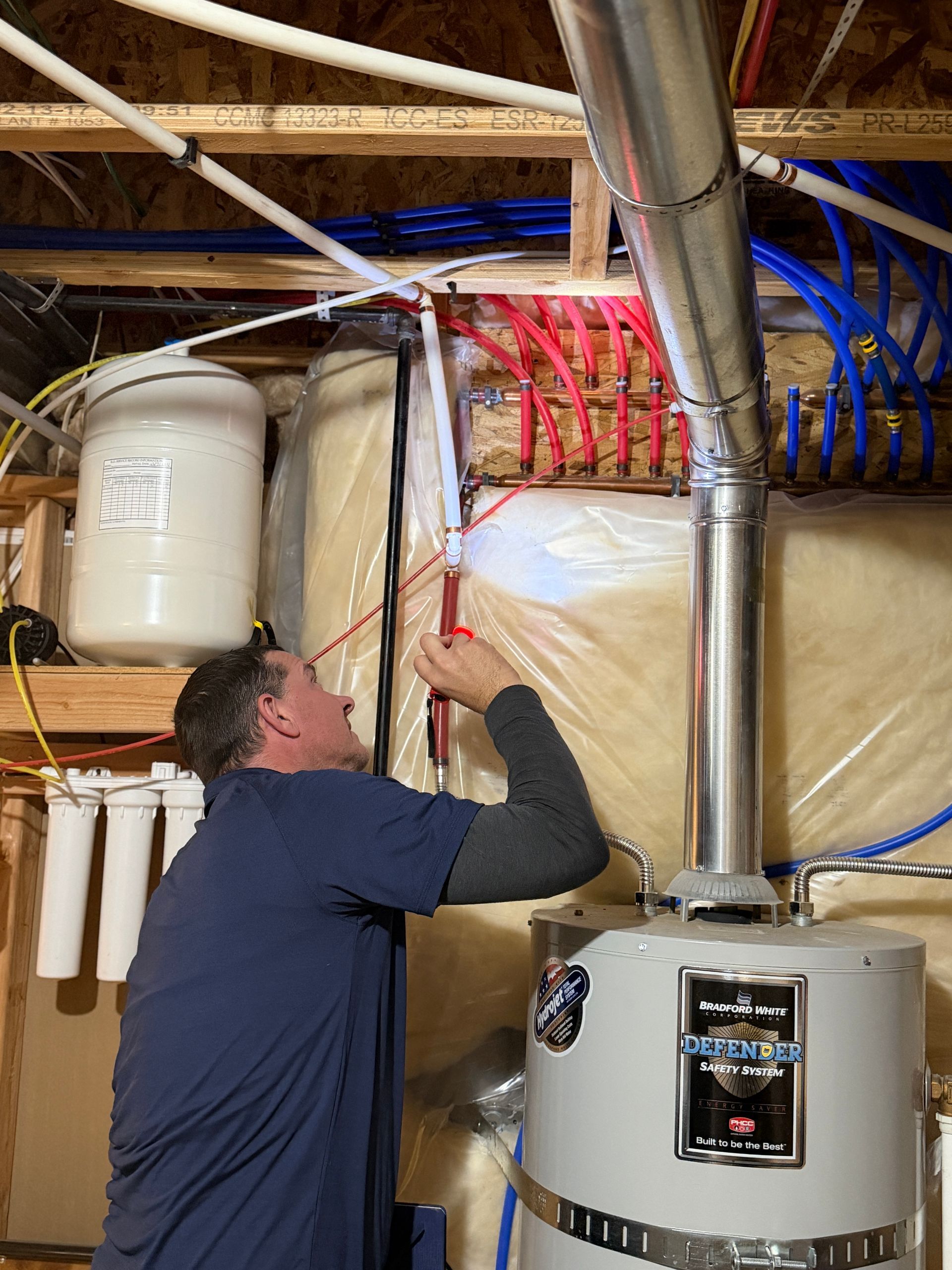 Public Adjuster inspecting water supply line