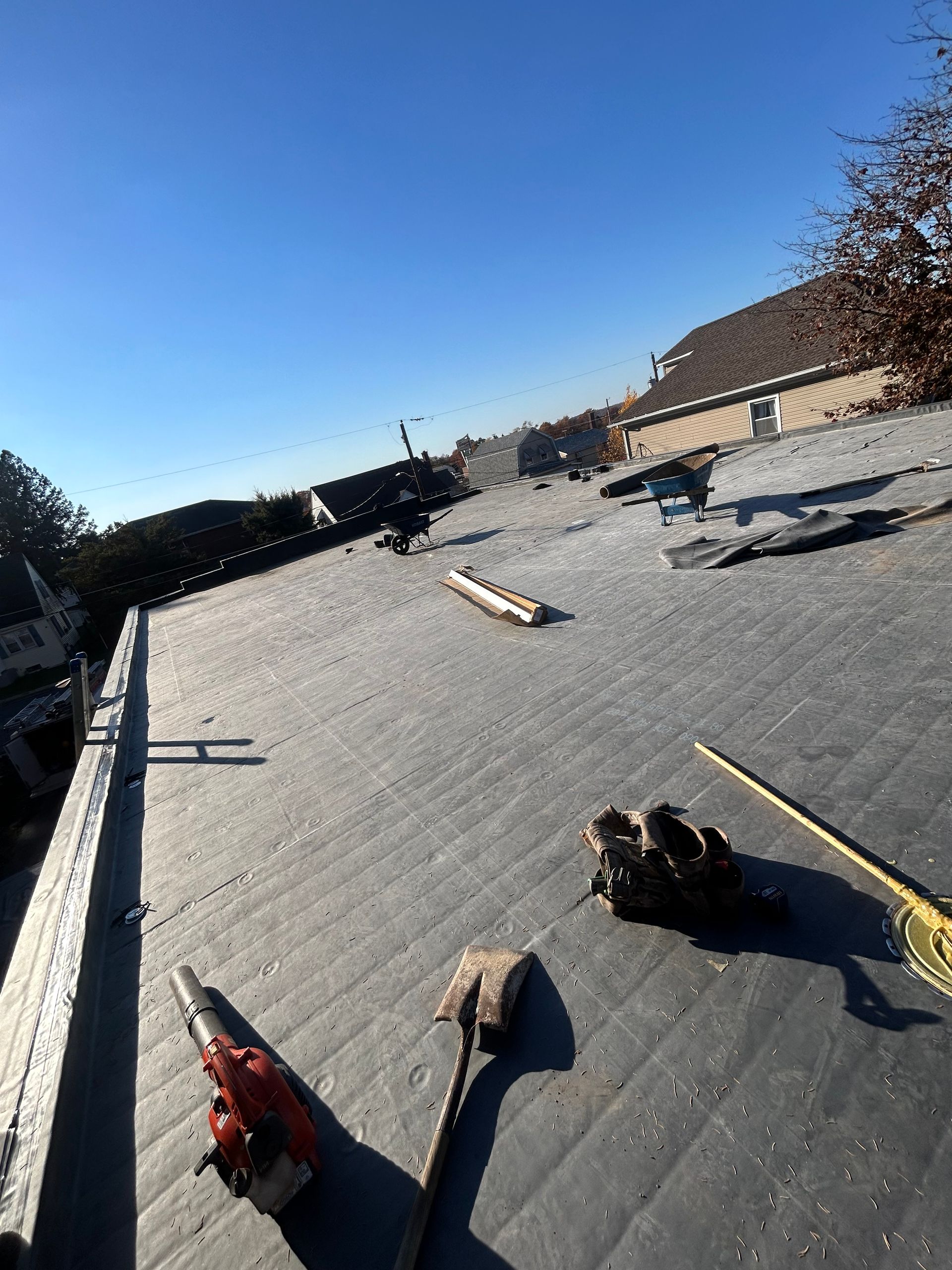 A flat roof with tools on it