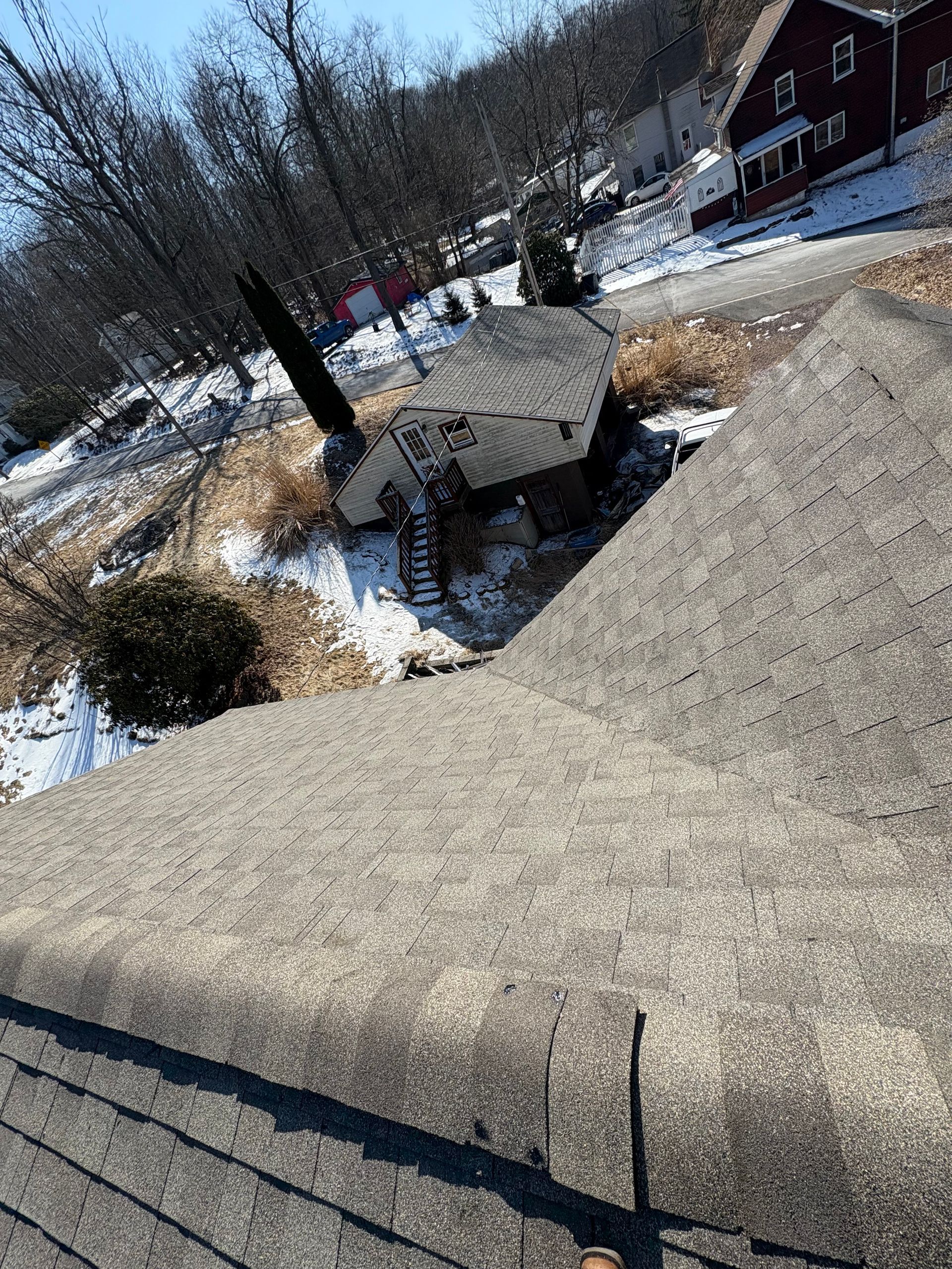 A tank is sitting on top of a concrete wall