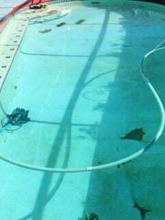Dirty Swimming Pool and Debris — Bradenton, FL — Doug's Pool Service