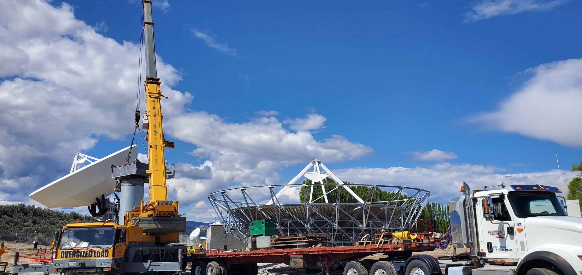 Truck Transporting Satellite Dish — Wenatchee, WA — Columbia Cranes
