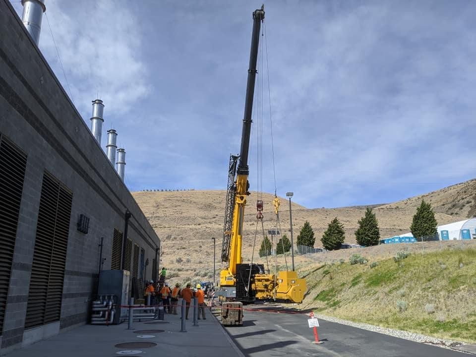 Crane Lifting Yellow Engine — Wenatchee, WA — Columbia Cranes