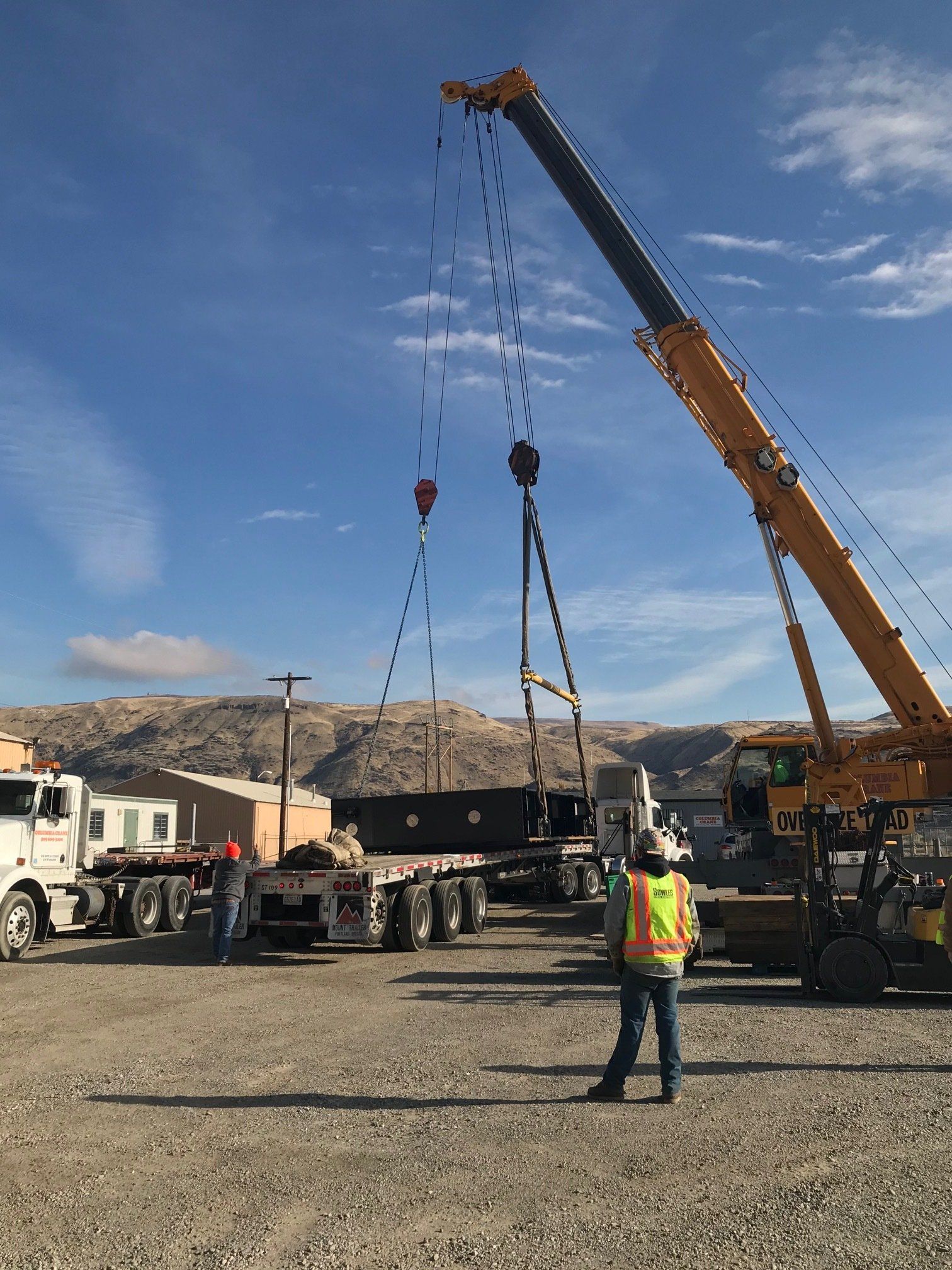 Placing Load on a Flatbed Truck — Wenatchee, WA — Columbia Cranes