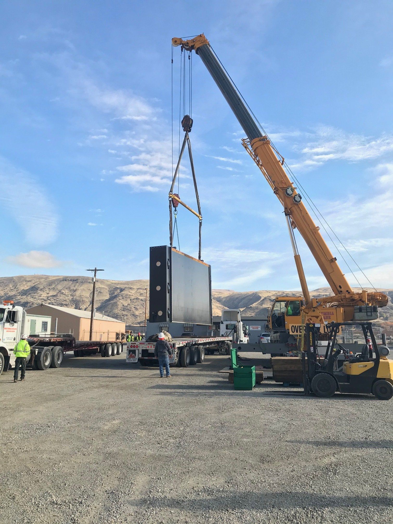 Trash Rack on a Flatbed Truck — Wenatchee, WA — Columbia Cranes