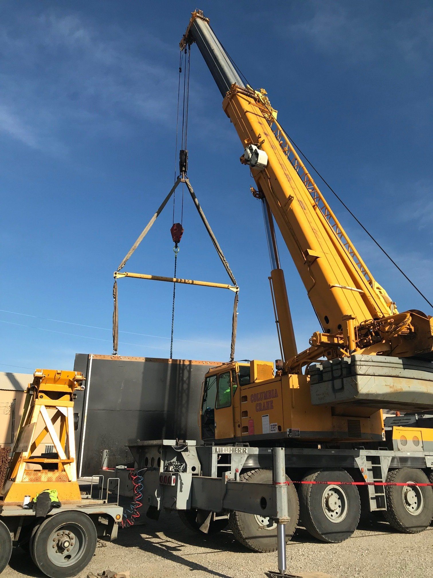 Yellow Crane Lifting a Trash Rack — Wenatchee, WA — Columbia Cranes