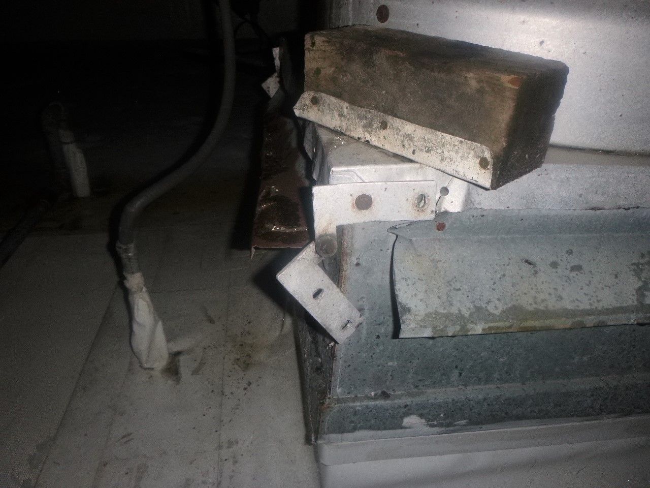 A piece of metal is sitting on top of another piece of metal.