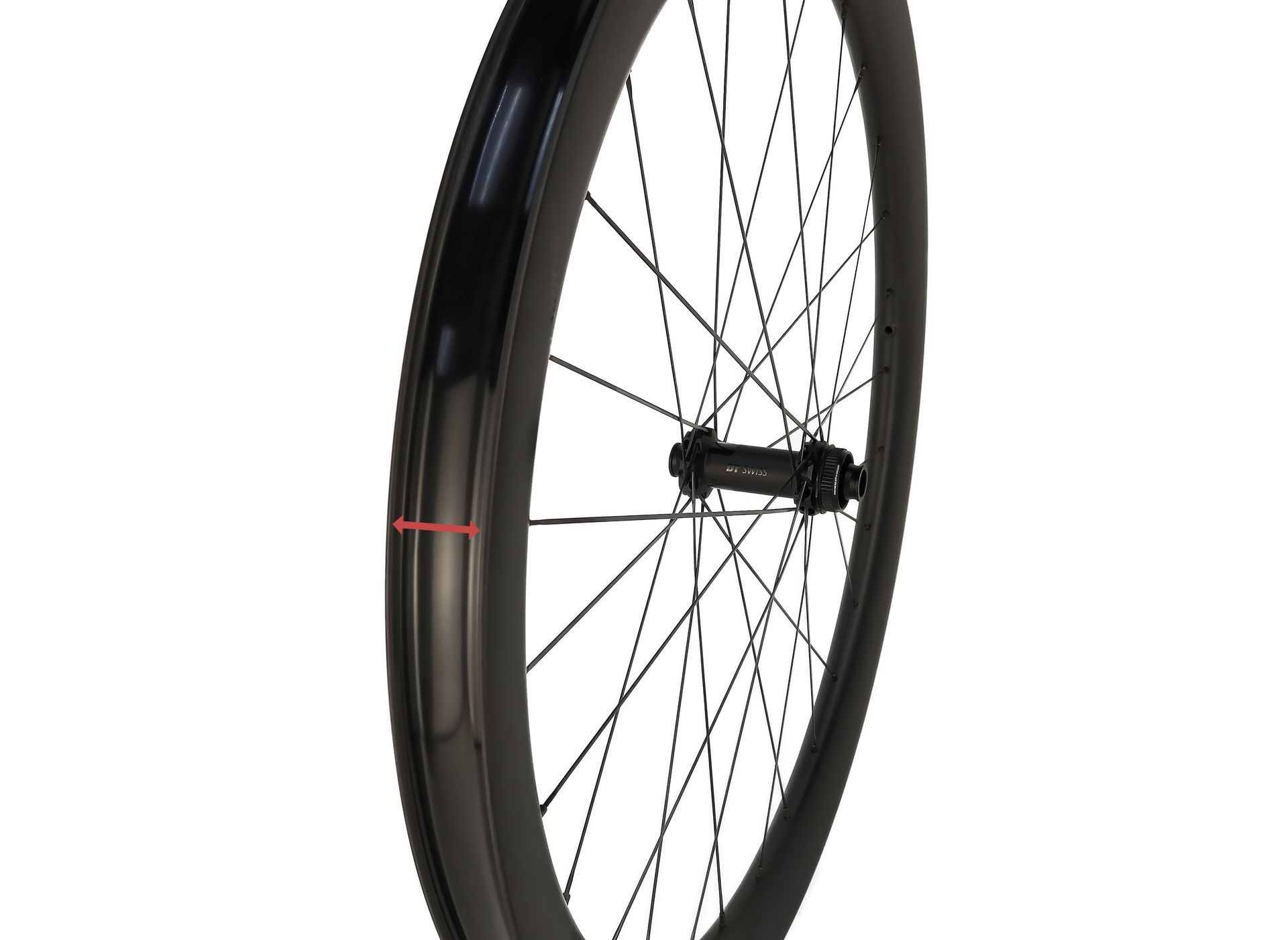 A close up of a wide aero carbon tailwind bicycle wheel on a white background.