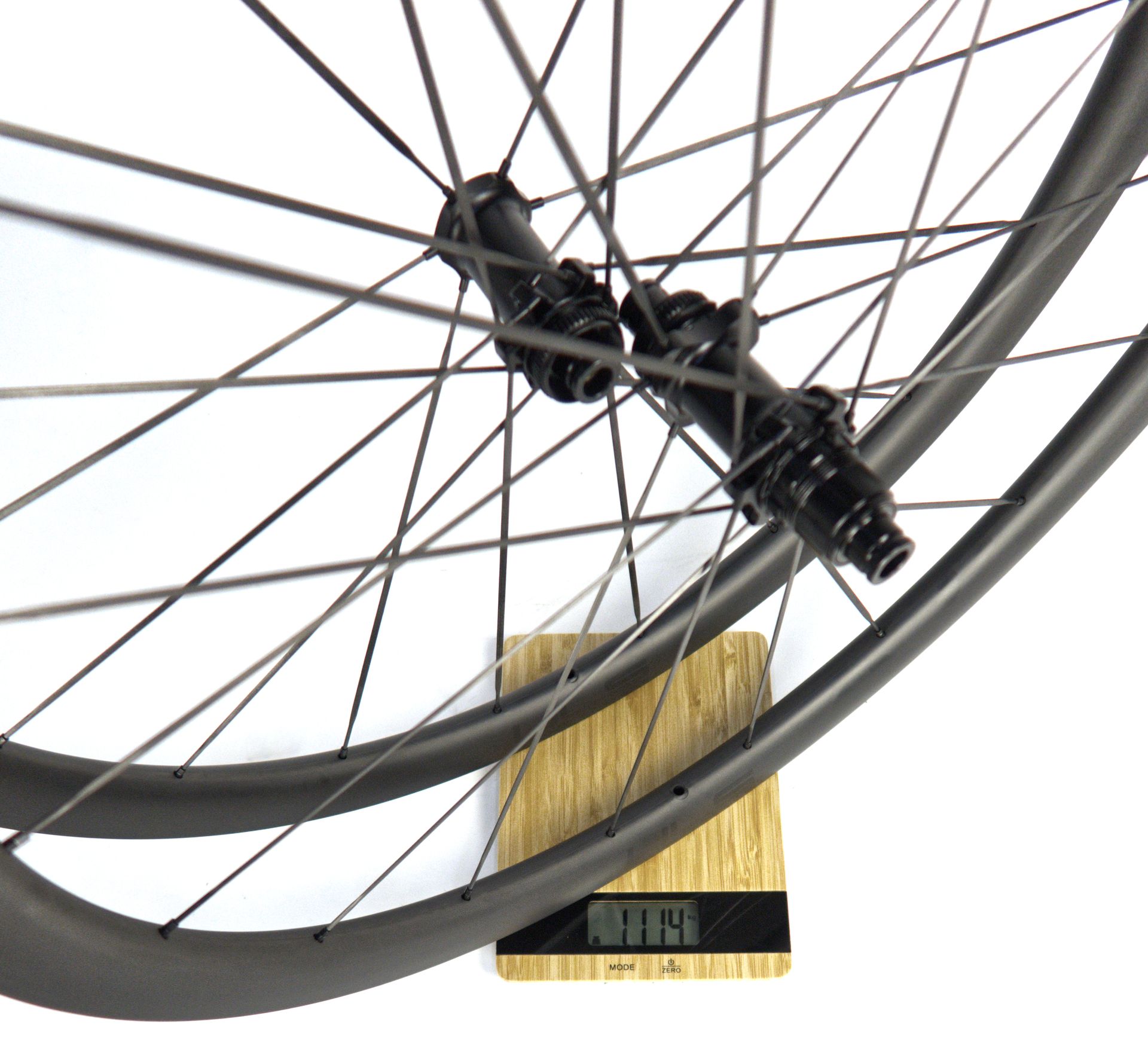 A pair of carbon Tailwind bicycle wheels with waved shape and carbon spokes