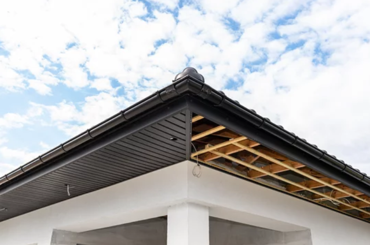 A house soffit, showcasing a well-maintained eave with clean lines and smooth finish.