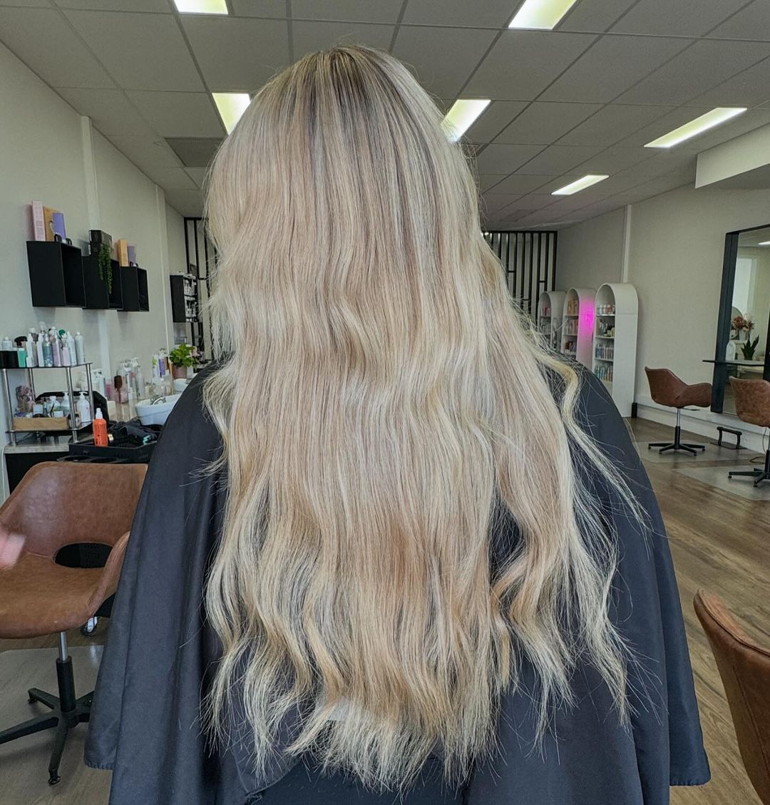 Two Women With Long Hair Are Standing Next To Each Other In A Salon — Mysa on Flinders In Townsville City, QLD
