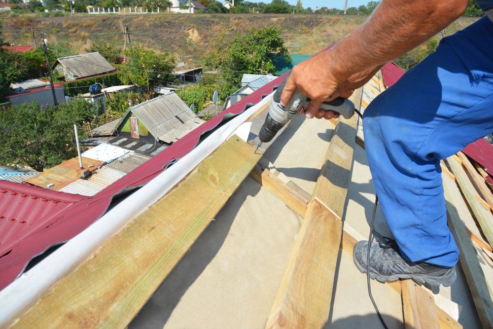 Contractor Repairing Residential Roofing — Pittsburgh, PA — The Roof Pack