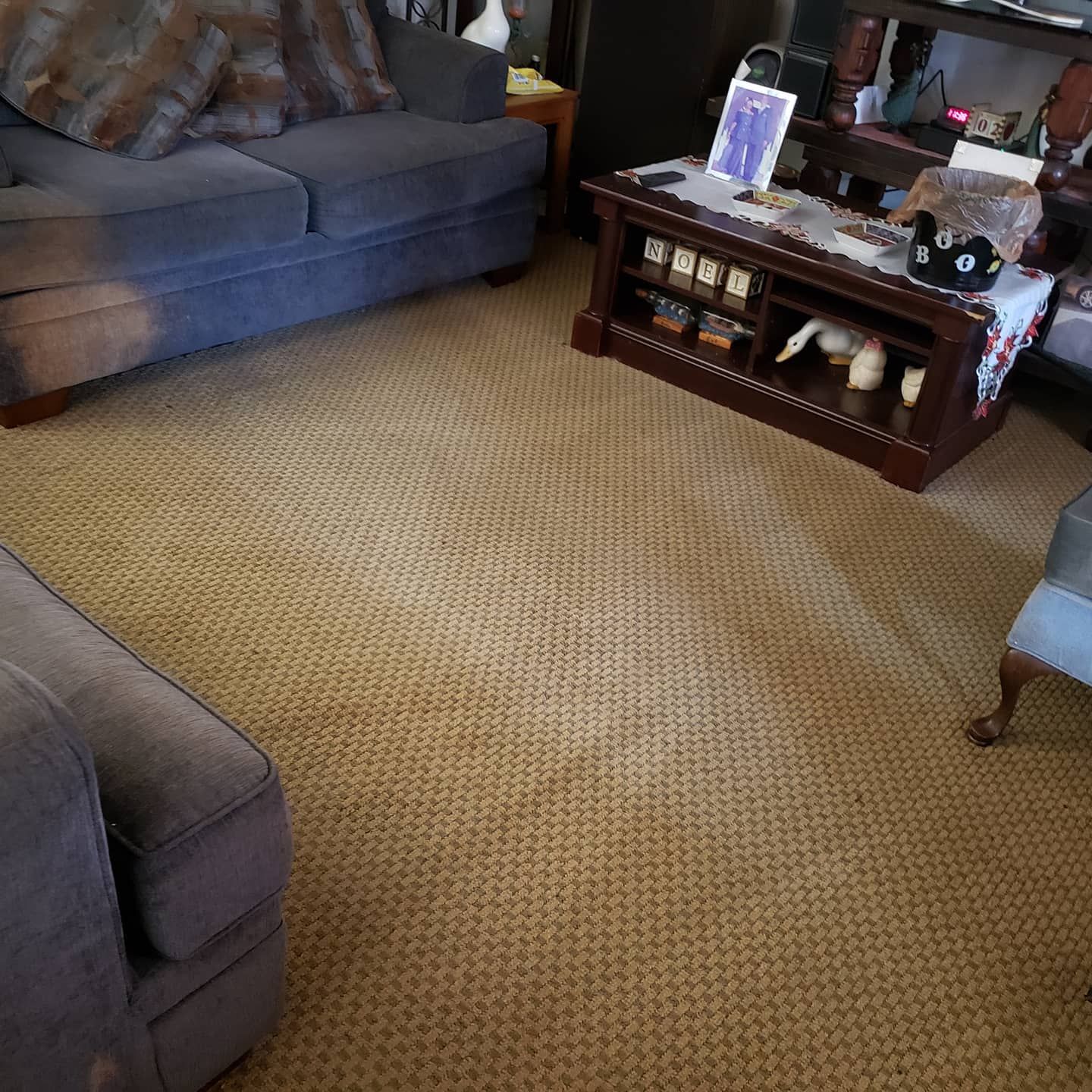 A living room with a couch and a coffee table