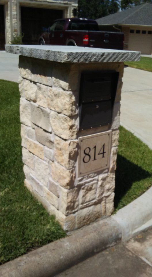 Stone mailbox with address