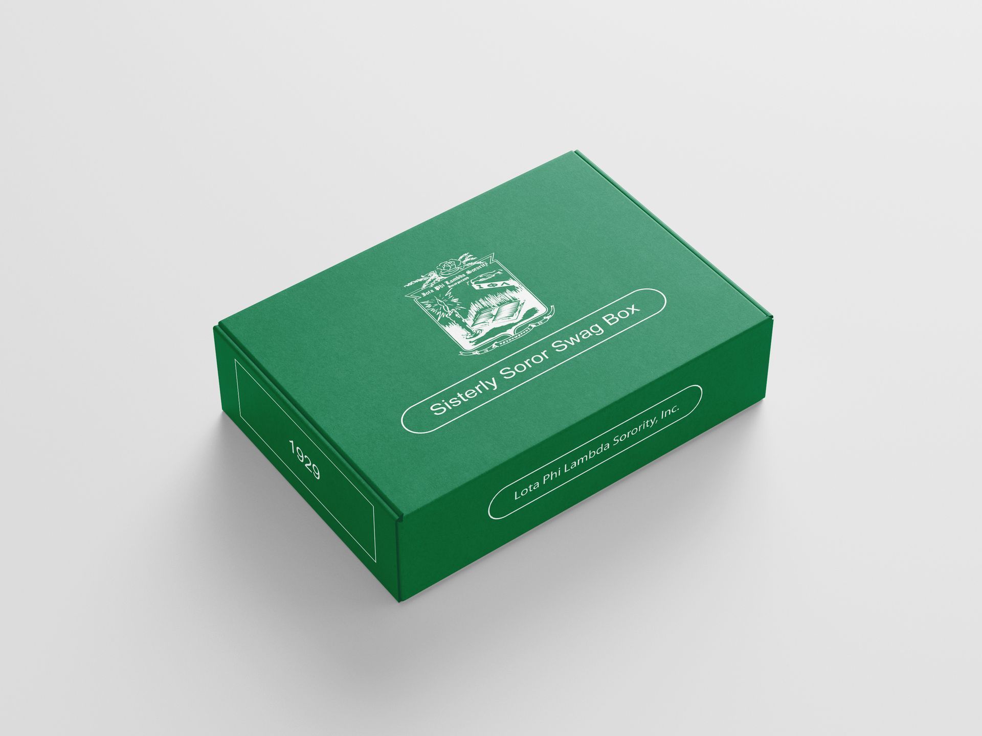 A green box to hold your iota subscription items is sitting on a white surface.