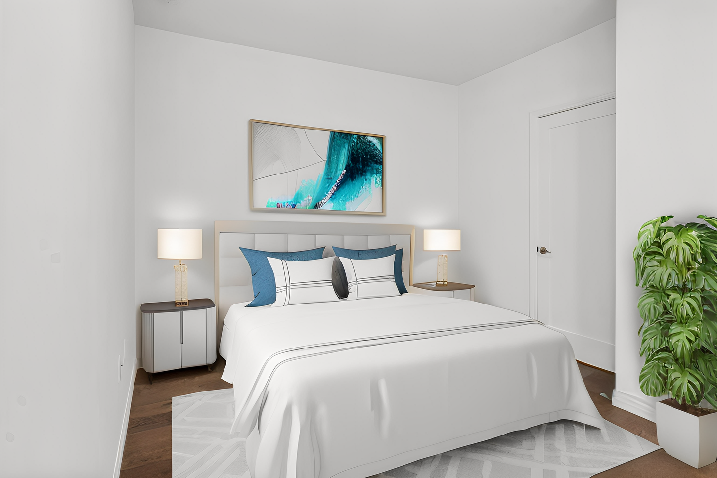 A bedroom with a bed , nightstands , lamps and a painting on the wall.