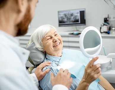 Elderly Woman Enjoying Her Smile — Empire, MI — Empire Family Dental