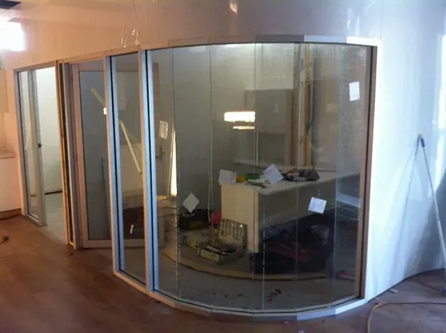 Curved Design Glass Window — Capitol Glass in Taminda, NSW